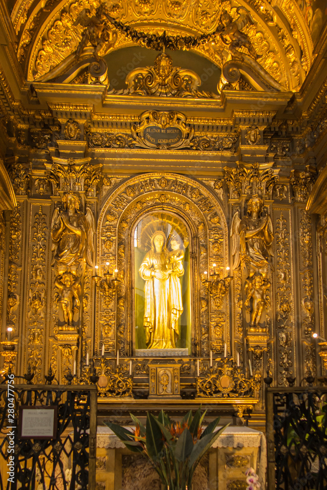 Turin Italy, June 27, 2019: Duomo di Torino San Giovanni Battista catholic cathedral. Figure of the Virgin Mary with a child in one of the chapels.