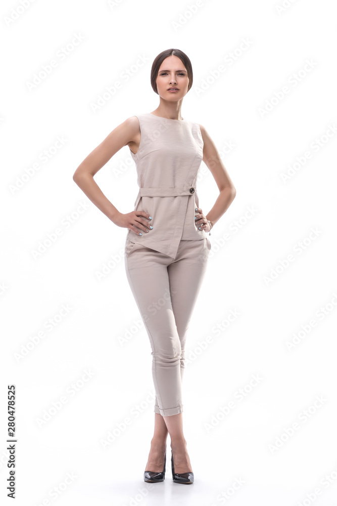 modern young woman in a pantsuit. isolated on white modern young woman in a pantsuit. isolated on white