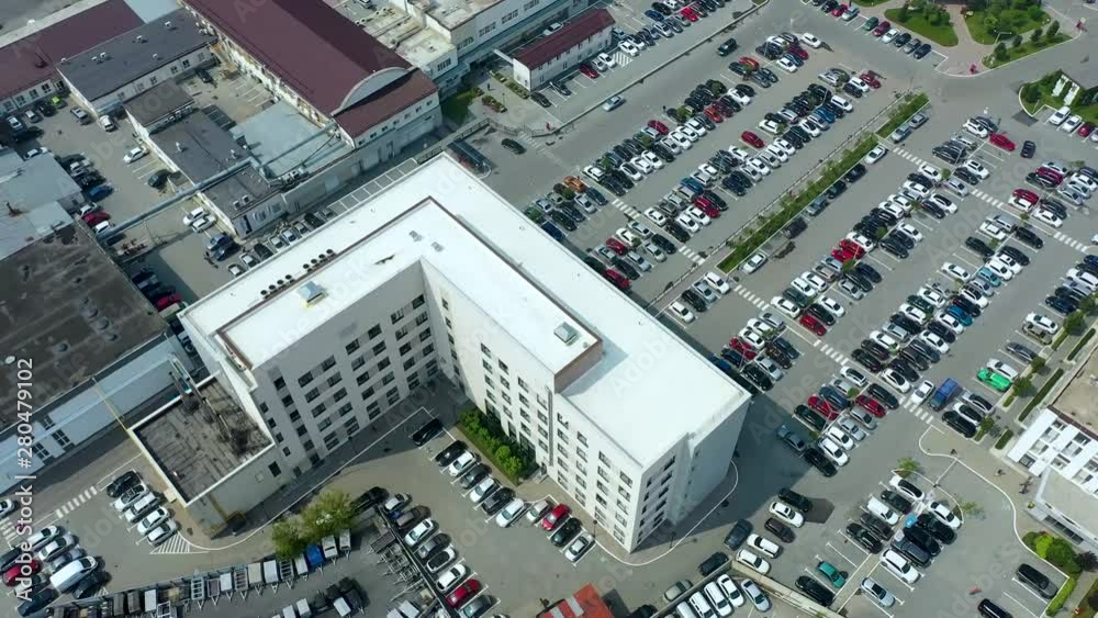 aerial view on modern office business district of many buildings, Parking lots, recreation and infrastructure , top view 4 K aerial view on modern office business district of many buildings, Parking lots, recreation and infrastructure , top view 4 K