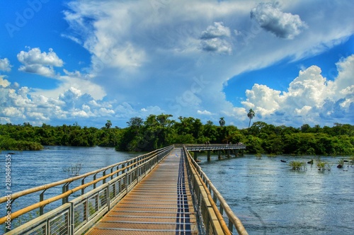 Wooden Bridge with Cloudy Sky