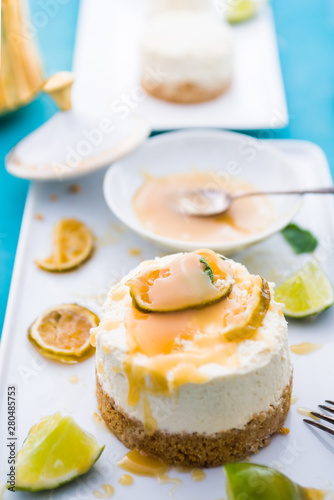 Mojito  cheesecake with rum  and lime syrup, on a rectangualr plate ,flatlay,topview