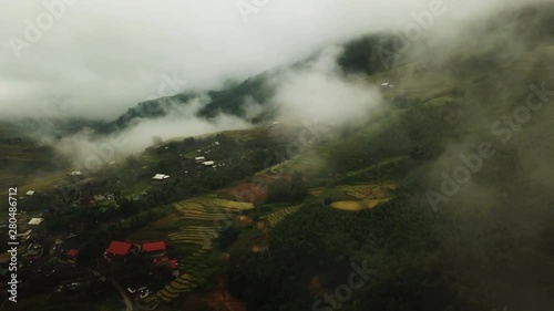 maestic cloud formations covering Moang Hoa Valley, sapa rice terraces Vietnam, aerial drone shot photo