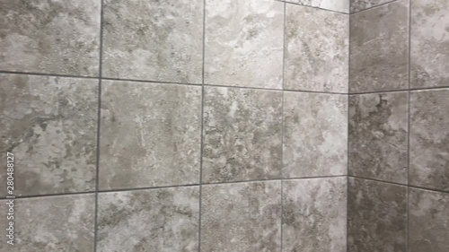 Wallpaper Mural Ceramic floor tiles in gray and dark color, square shape inline design Torontodigital.ca