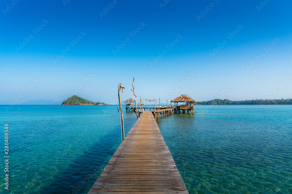 Wooden bar in sea and hut with clear sky in Koh Mak at Trat, Thailand. Summer, Travel, Vacation and Holiday concept.