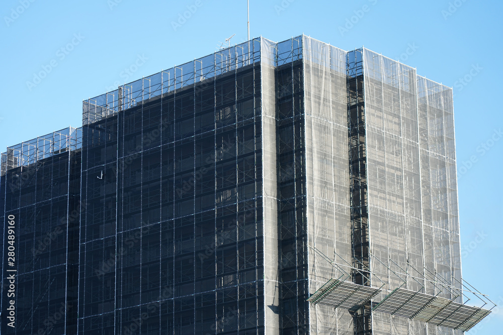 Tokyo,Japan-July 26, 2019: Exterior wall repairing work of an apartment house