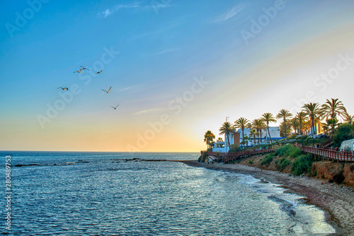 Valokuvatapetti Playas de la Costa del Sol al atardecer