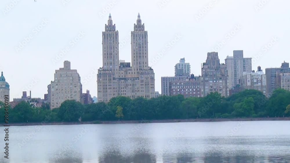 Central park, Manhattan, New York Lake view with cityscape Central park, Manhattan, New York Lake view with cityscape