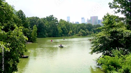 Boat pedals swimming on a pond in the Central Park photo