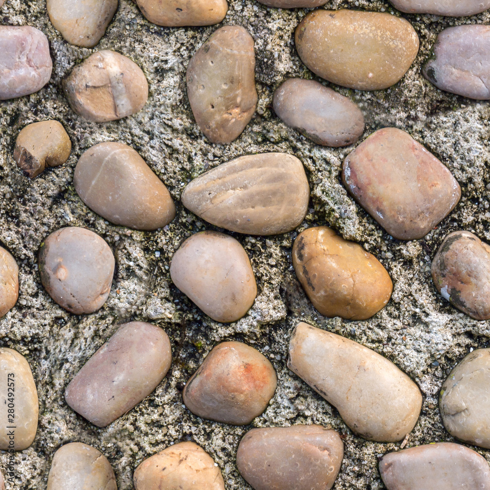 Pebble and concrete paving seamless tileable texture Pebble and concrete paving seamless tileable texture