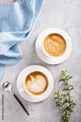 Fotografija Coffee latte or cappuccino with latte art on top