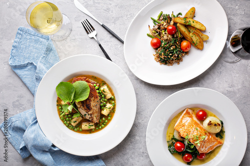Принти на полотні Spring lunch trio of salmon, chicken and vegetarian dish