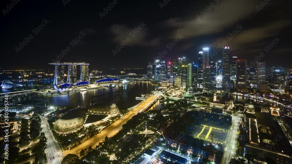 4k aerial time lapse of night scene at Singapore city skyline. 4k aerial time lapse of night scene at Singapore city skyline.