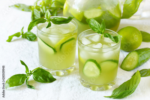 cold drink with basil, cucumber and lime. Mojito, lemonade with basil.