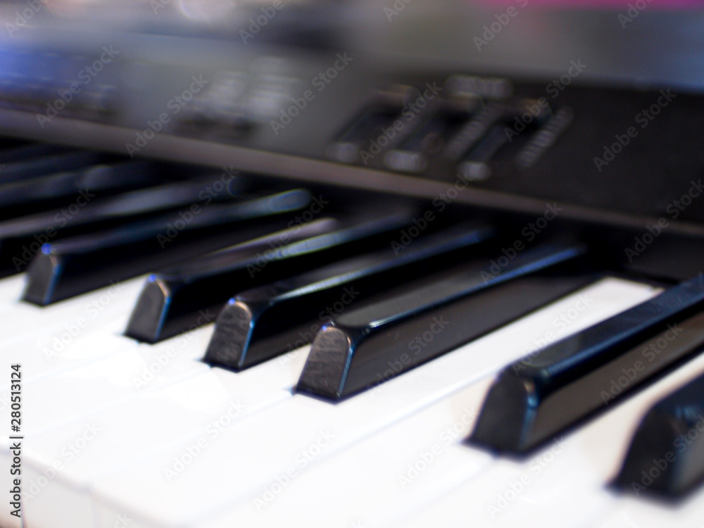 Close-up of keyboard piano keys. Close frontal view music instrument song abstract education background