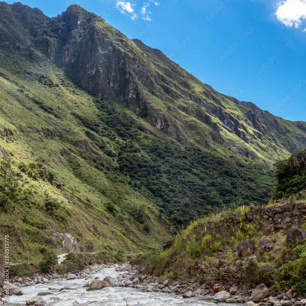 The Santa Teresa River in green lush valley. Hiking trail to Machu Picchu, Peru