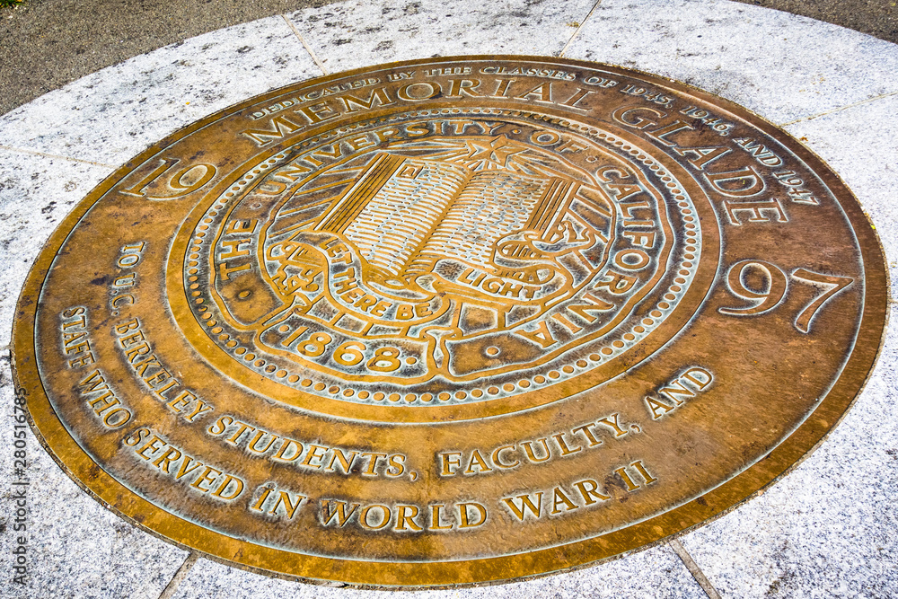 The seal of the University of California, Berkeley on the campus on the ground