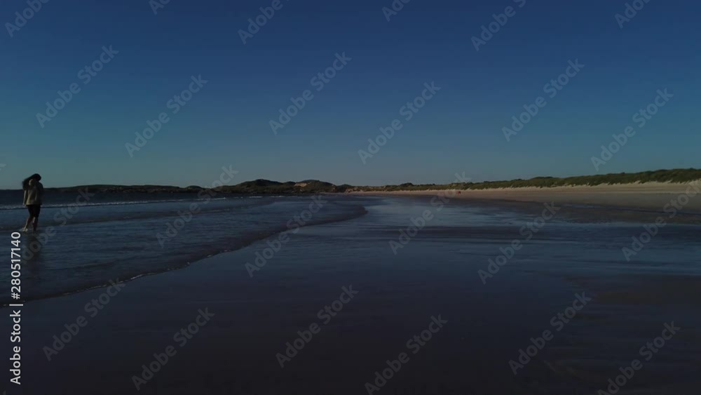 Beach walk along Carrickfinn Beach, Donegal Ireland on a sunny afternoon.
Content shot at 4K 60fps