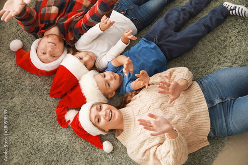 Happy family at home on Christmas eve