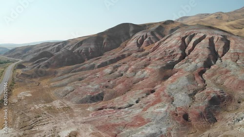 Rainbow hills of Khizi, landscape red mountains. Xizi, Azerbaijan. Aerial video 4k