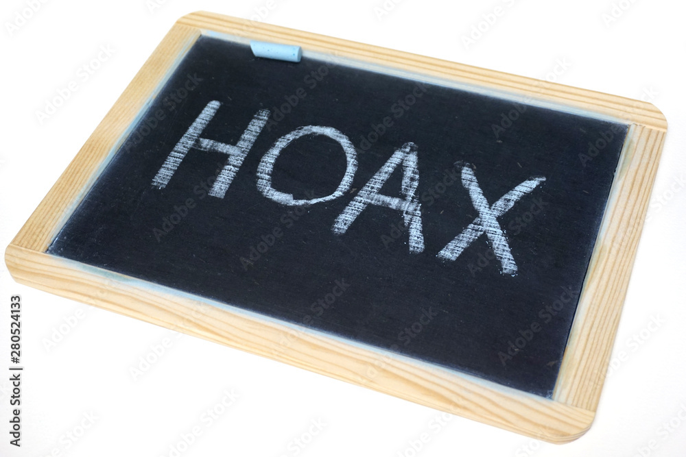 Hoax and fake message on chalkboard Hoax and fake message on chalkboard