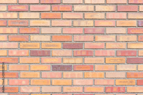 Colorful red and brown brick wall