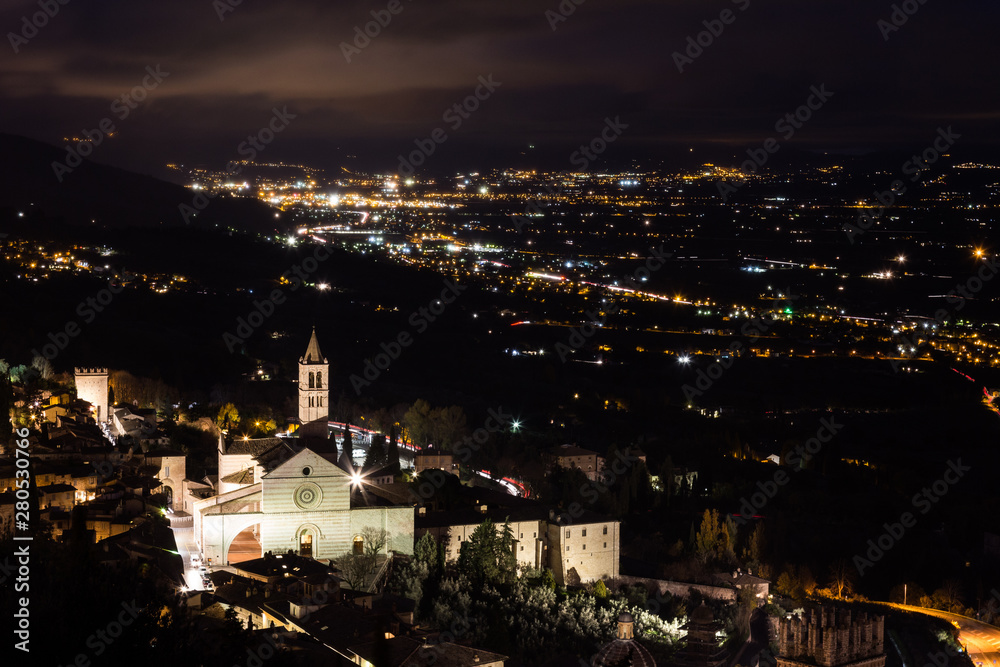 Panoramic view of the historic town of Assisi (Umbria, Italy) at night