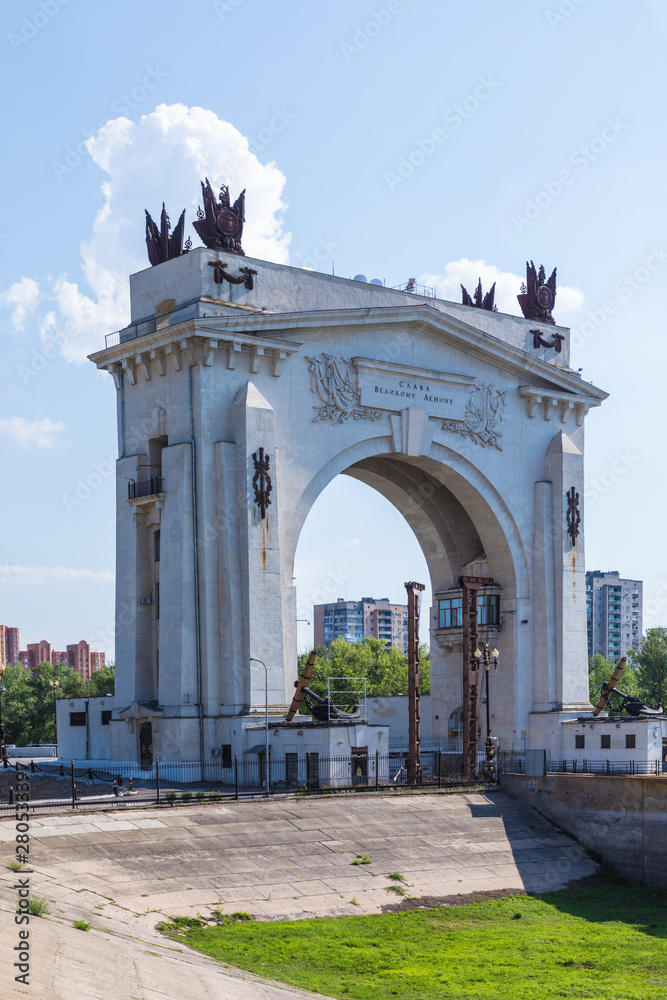 The triumphal arch or gate on the first sluice on the Volga-Don Channel in Volgograd city in the hot sunny summer day