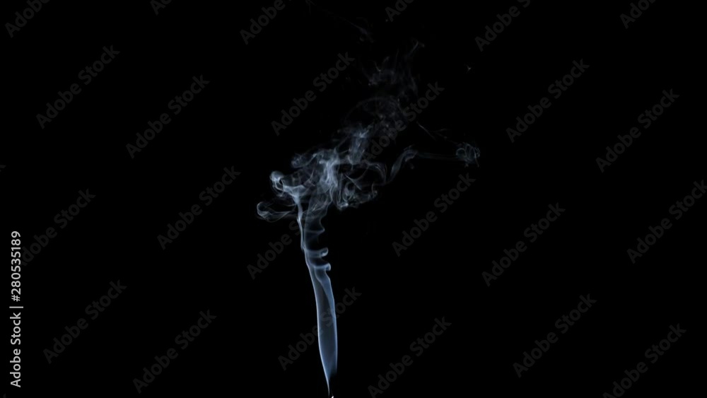 Thin Flexible Trickle of Smoke. Graceful Bends of the Blue Smoke. Natural Colorful smoke rises up and spins into graceful spirals. Footage is perfect for the layer with different blending modes. Thin Flexible Trickle of Smoke. Graceful Bends of the Blue Smoke. Natural Colorful smoke rises up and spins into graceful spirals. Footage is perfect for the layer with different blending modes.