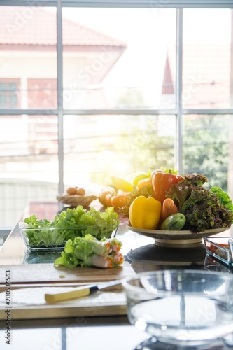 Foto Basket of fruit preparing before breakfast put by side of window