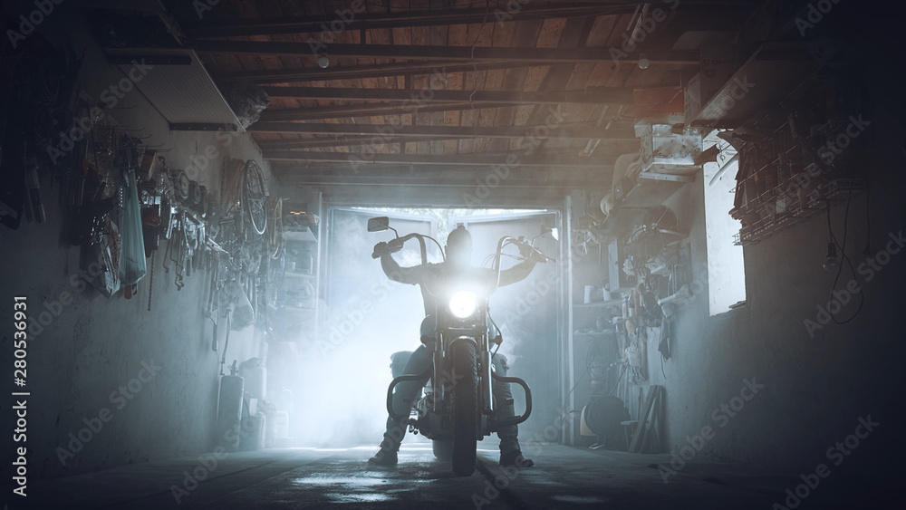 headlamp chopper in biker garage