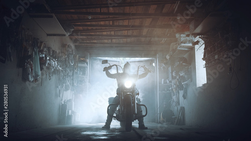 Fotografiet headlamp chopper in biker garage