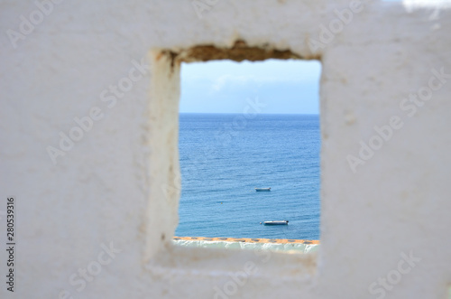 The Ocean Seen Through a Window