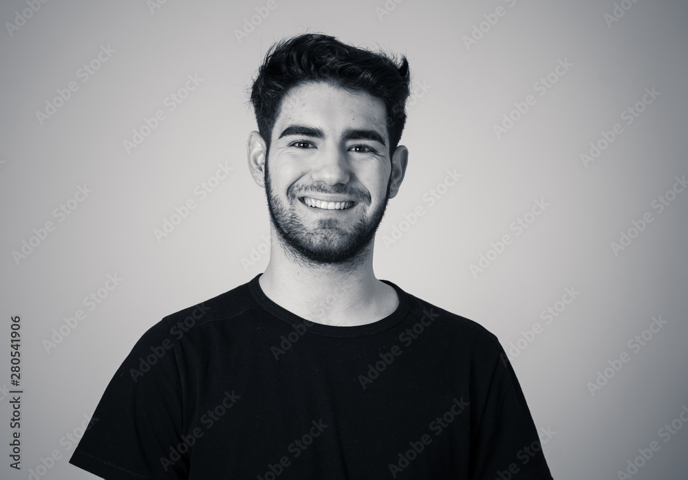 Fototapeta premium Human expressions and emotions. Joyful young attractive man smiling with happy face