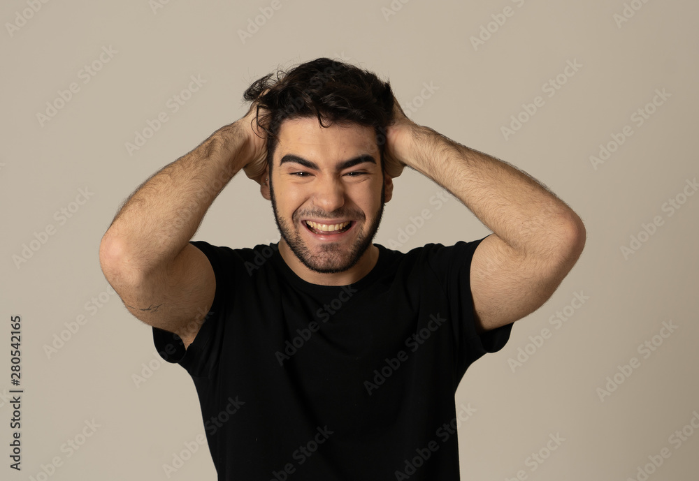 Human expressions and emotions. Young attractive man with a surprised face, eyes and mouth open.