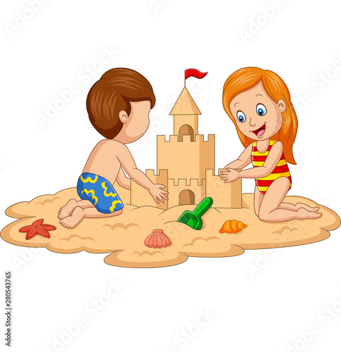Children making sand castle at tropical beach