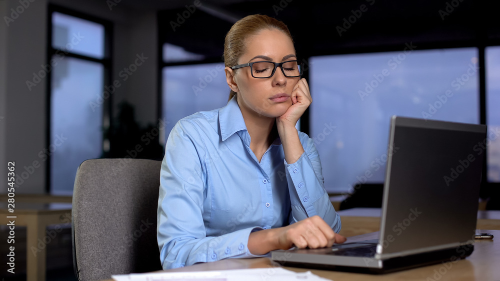 Exhausted woman with closed eyes resting in office, lack of sleep busy lifestyle Exhausted woman with closed eyes resting in office, lack of sleep busy lifestyle