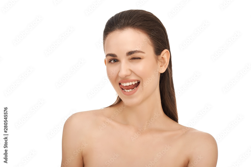 Beautiful smiling brunette girl with clean skin and natural make-up and white teeth on white background. Beautiful smiling brunette girl with clean skin and natural make-up and white teeth on white background.