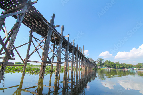 old wooden bridge over the river in myanmar