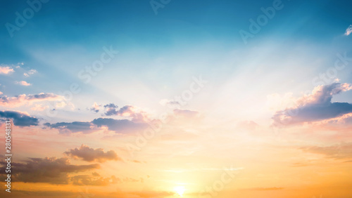 World Tourism Day concept: Beautiful sunset sky above clouds with dramatic light