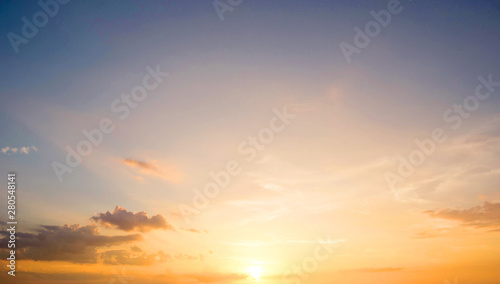 World Tourism Day concept:  Beautiful sunset sky above clouds with dramatic light © paul