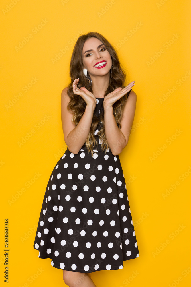 Excited Woman In Black Cocktail Dress In White Polka Dots Excited Woman In Black Cocktail Dress In White Polka Dots