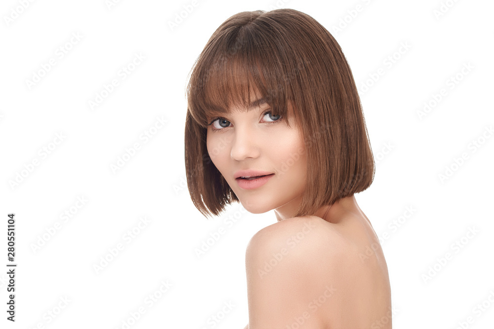 Beauty portrait of a beautiful young girl with beautiful glowing skin and natural makeup on a white background. Beauty portrait of a beautiful young girl with beautiful glowing skin and natural makeup on a white background.