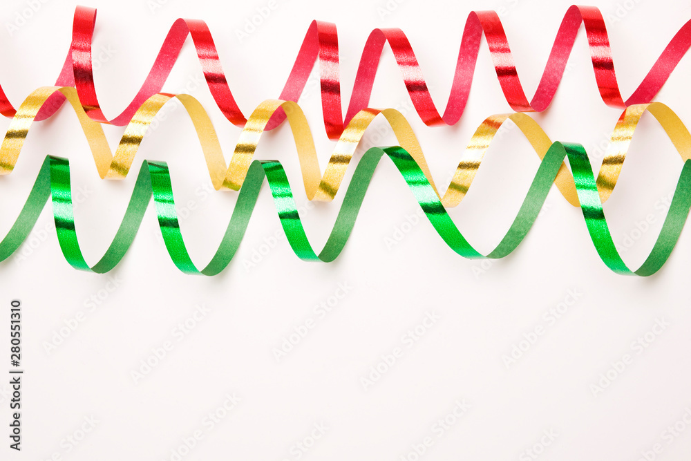 Paper streamers on white background with space for copy text