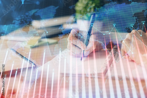 Wallpaper Mural Financial forex graph drawn over hands taking notes background. Concept of research. Multi exposure Torontodigital.ca