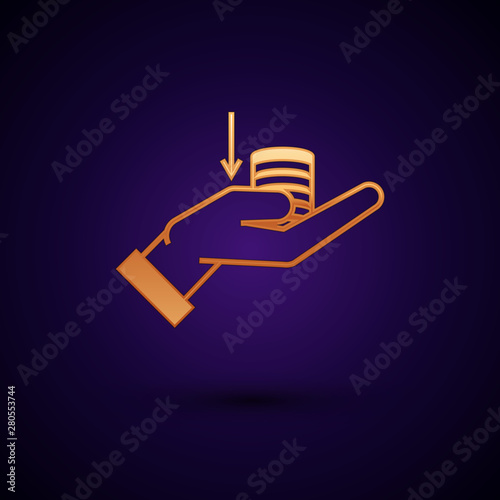 Gold Money on hand icon isolated on dark blue background. Palm holds cash with down. Cash salary decrease. Vector Illustration