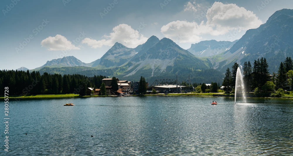 landscape view of the lake and town of Arosa in the Swiss Alps