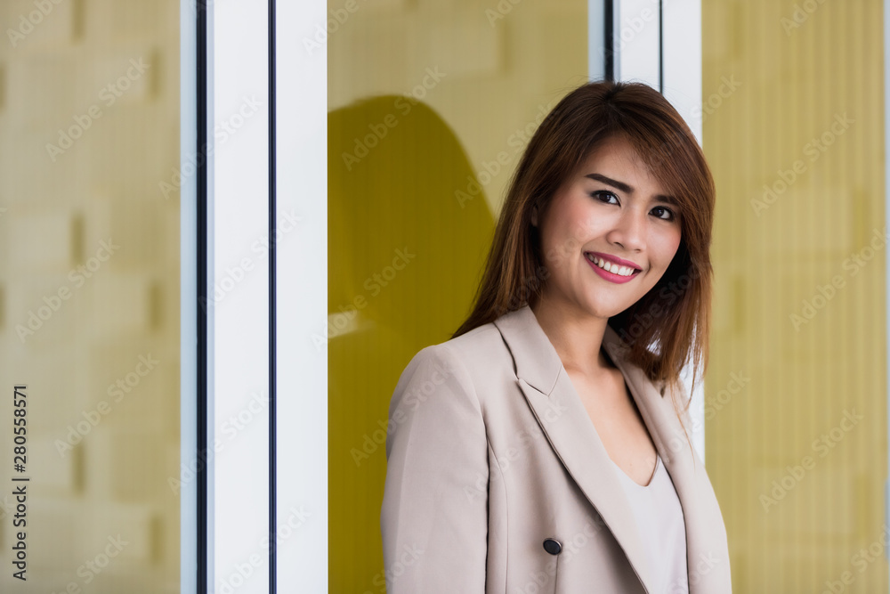 Image of smile Asian businesswoman standing .. Image of smile Asian businesswoman standing ..