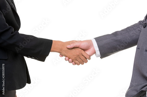 Businessmen hands shake together..