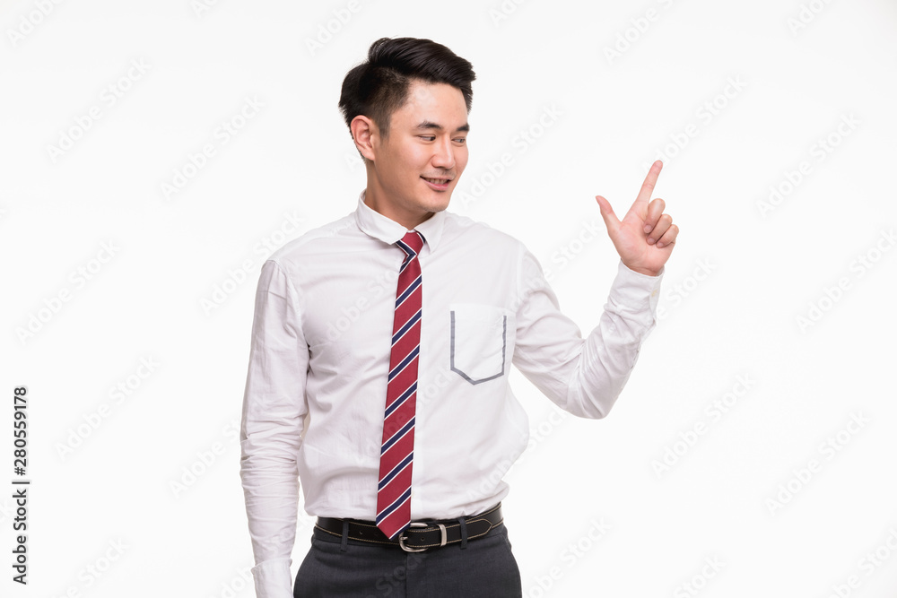 Asian businessman standing and point his finger.. Asian businessman standing and point his finger..