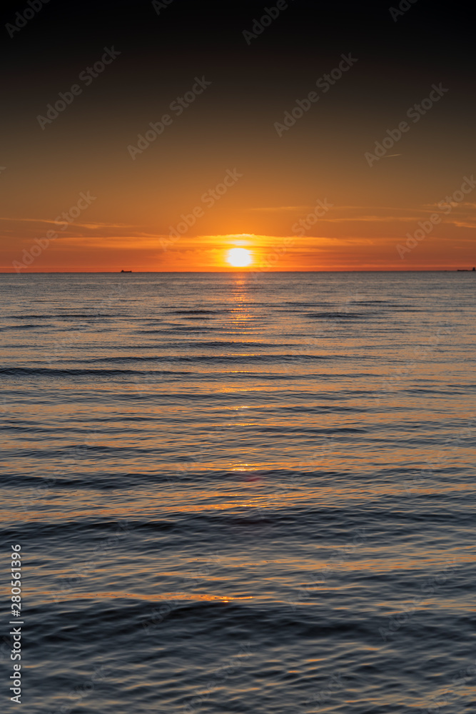 Orange sunset on Baltic sea.